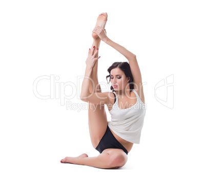 Image of sensual pilates trainer posing in studio