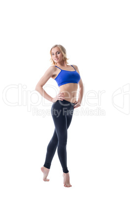 Smiling blonde sportswoman, isolated on white