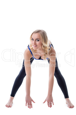 Smiling girl doing fitness workout at camera