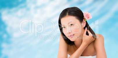 Composite image of relaxed woman on the massage table