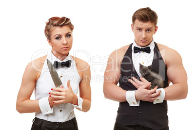 Cute girl with knife and brutal man holding kitten