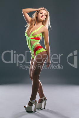 Image of gorgeous go-go dancer posing at camera