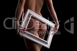 Image of elastic female ass framed