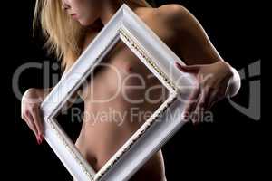 Close-up of young girl's naked body framed
