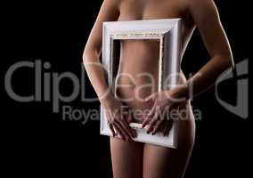 Close-up of naked girl's belly framed