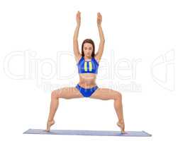 Graceful brunette doing yoga exercise