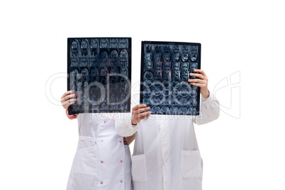 Doctors holding tomograms in front of them