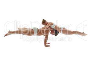Image of athletes keeping balance in handstand