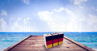 Composite image of german flag suitcase