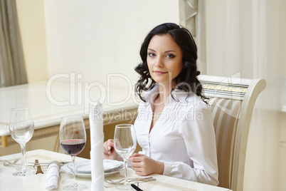 Good-looking woman posing during business lunch