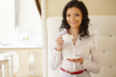 Attractive business woman during coffee break
