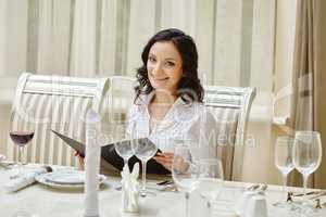 Smiling brunette posing during business lunch