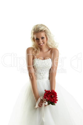 Smiling blonde posing as happy bride