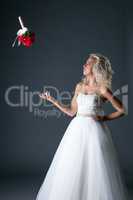 Shot of elegant bride throws her bouquet