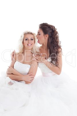 Image of cute brides fooling around at camera