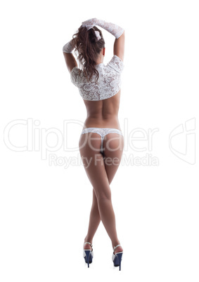 Rear view of slim woman in sexy bridal accessories