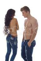 Image of hot topless models advertises jeans
