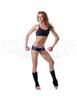Sexy female bodybuilder exercising with dumbbells
