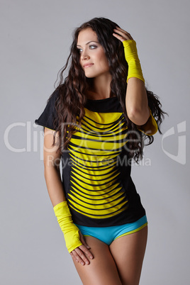 Charming long-haired woman dressed in sportswear