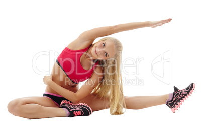 Smiling blonde doing bend in front of camera