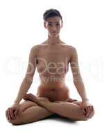 Studio photo of nude woman posing in yoga pose