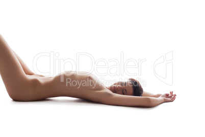 Image of relaxed smiling naked woman lying