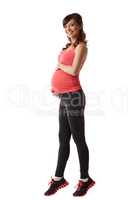 Cheerful pregnant woman exercising aerobics