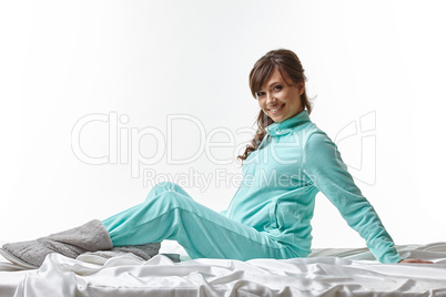Cute pregnant woman posing in comfortable clothes