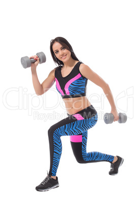 Nice woman doing fitness exercise with dumbbells