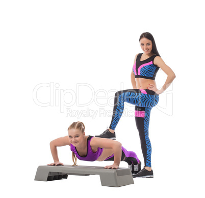 Cute sporty girl helping her partner to train