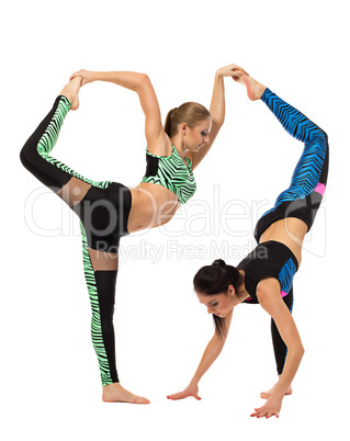 Acrobatic composition of two flexible girls