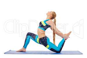 Side view of pretty young woman doing aerobics