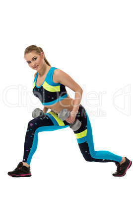 Energetic girl actively exercising with dumbbells