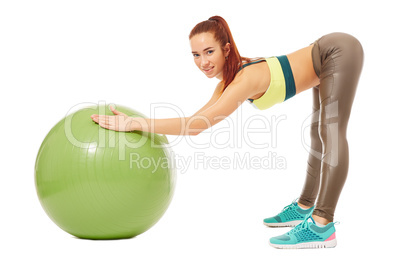 Smiling pretty girl engaged in aerobics