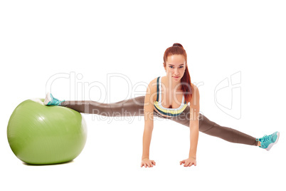 Charming flexible girl engaged in pilates
