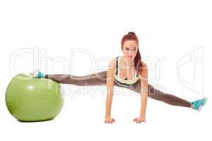 Charming flexible girl engaged in pilates
