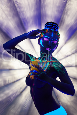 Fantasy nude girl doing selfie under UV light