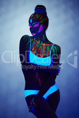 Image of fantastic girl glows in ultraviolet
