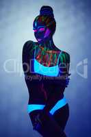 Image of fantastic girl glows in ultraviolet