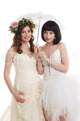 Beautiful brides. Concept of double wedding