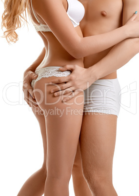 Man passionately hugging sexy girl, close-up
