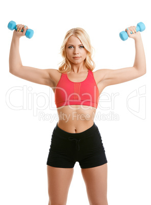 Lovely blonde exercising with dumbbells