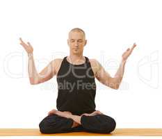 Image of meditator man posing in lotus position