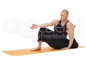 Yoga training. Studio photo of man exercising