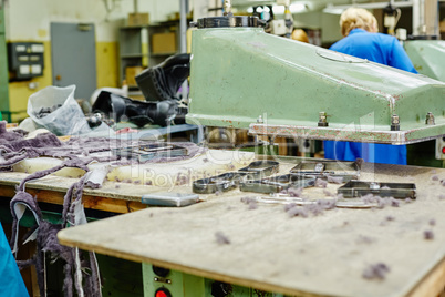 Manufacture of footwear. Cutting fur details