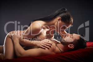 Studio shot of passionate couple having sex