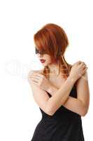 Seductive redhead submissive posing blindfolded
