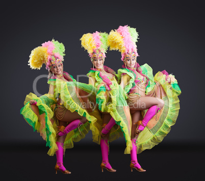 Fascinating dancers in colorful carnival costumes