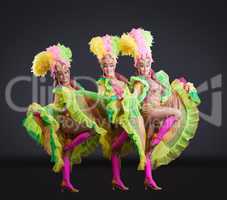 Fascinating dancers in colorful carnival costumes