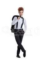 Beautiful red-haired woman posing in formal suit